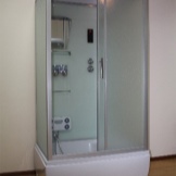 Rectangular shower enclosure with a deep tray