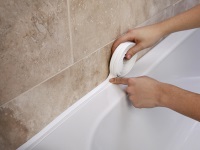 Self-adhesive tape-boarding for the bath