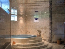 Mirrored ceiling in bathtub lighting