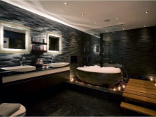 Stretch ceilings and light sources in the bathroom