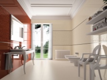 ベージュと赤のタイルを使ったバスルーム