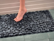 Alfombra de baño de goma con piedras