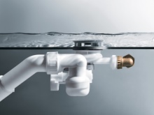 Llenado de la bañera por rebosadero