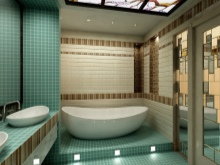 Žalios ir smėlio spalvos vonios kambarys 