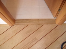 Bathroom threshold of laminated chipboard