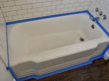 Auftragen von gusseisernem Bademail