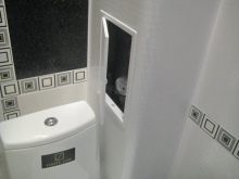 The box of plastic panels in the bathroom