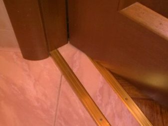 Tiled threshold with aluminum corner