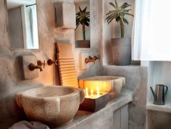 Lavabo en pierre naturelle dans la salle de bains