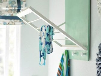 Placering av en väggmonterad torktumlare i badrummet.