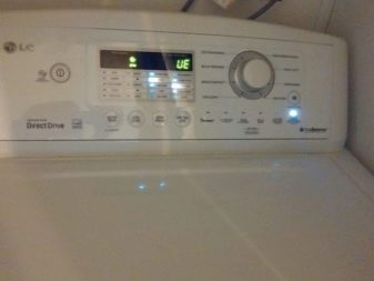 UE-fout op het scherm van de wasmachine - overbelasting of onjuiste verdeling van het wasgoed over de tank