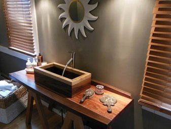 Een 75cm brede rechthoekige wastafel in natuurlijk hout voor de badkamer