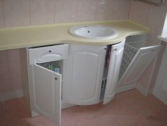 Semicircular cabinet with built-in sink and laundry basket
