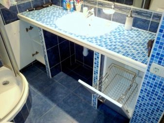 Bathroom cabinet with dirty laundry basket