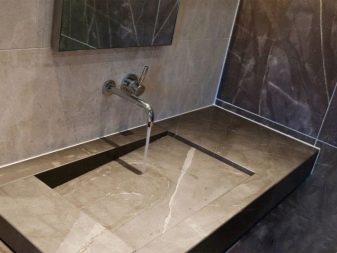 Flad, rektangulær håndvask af kunststen