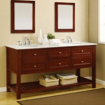 Wall cabinet for the bathroom with two built-in wash basins on wooden legs