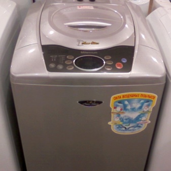 Mașină de încărcare verticală compactă