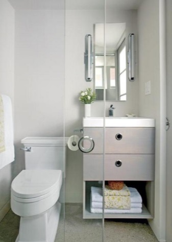 Compact cabinet and washbasin unit for a small bathroom