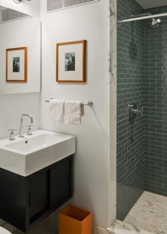 Suspended black cabinet with white sink