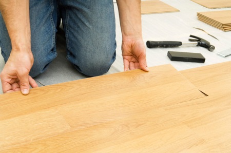 Installing water resistant laminate flooring