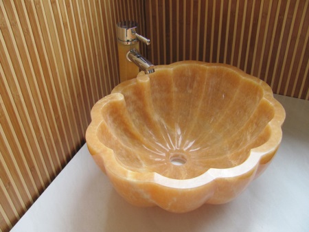 Corner wash basin made of onyx