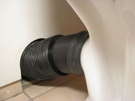 Black corrugated pipe for connecting the toilet bowl