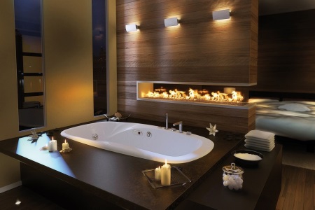 Beautiful bathroom with fireplace and candles