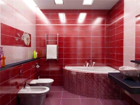 Baignoire rouge décorée de mosaïque