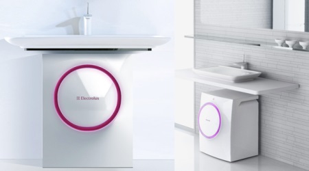 Waschmaschine über der Spüle