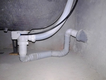 Vervanging en installatie van badafvoer en overloop 