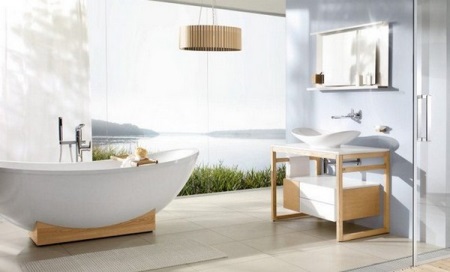 Baignoire ovale blanche dans un cadre en bois pour un ensemble de meubles de salle de bains de style scandinave