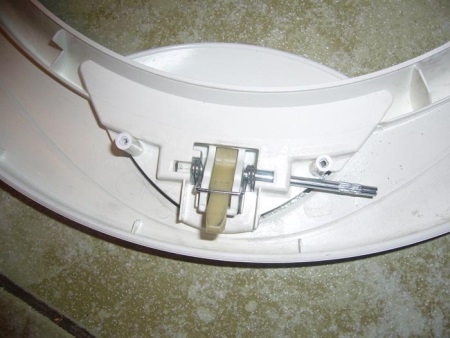 Udskiftning af håndtaget på vaskemaskinens dør