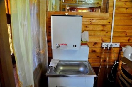 Външен душ и резервоар за топла вода - капацитет