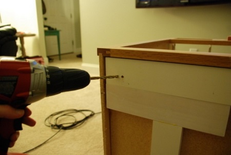Cabinet under the sink in the bathroom with their own hands