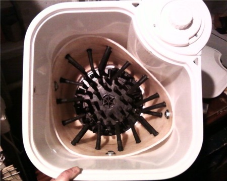 Spolverino di piume da una vecchia lavatrice