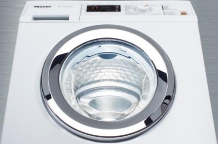 Tvättmaskin med trumma i honeycomb