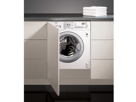 Concealed washing machine with tumble dryer